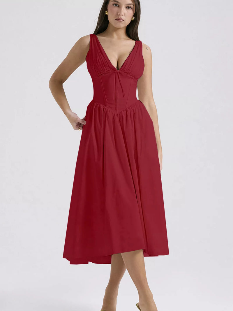 Red dress worn by a model on a white background