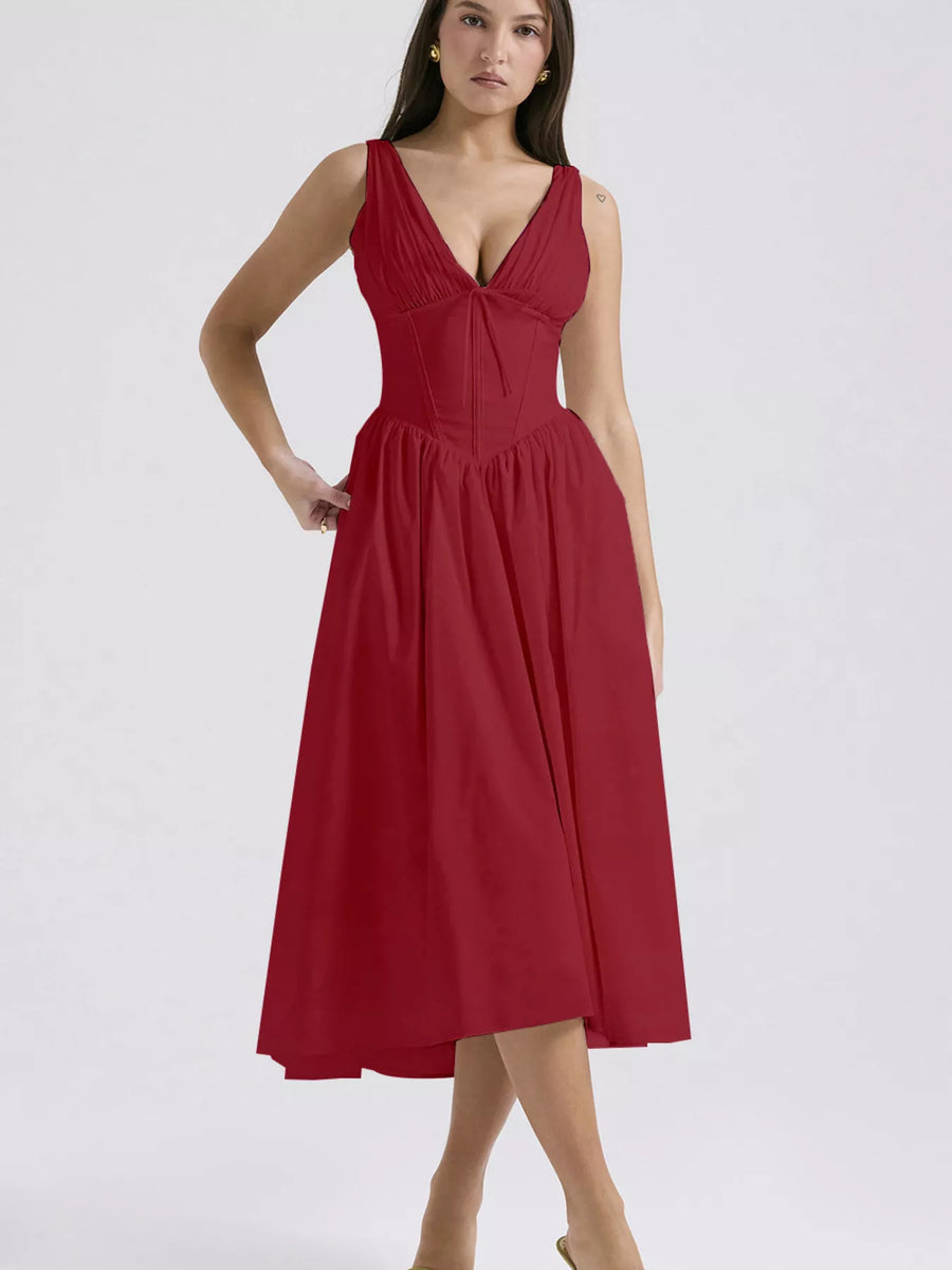 Red dress worn by a model on a white background