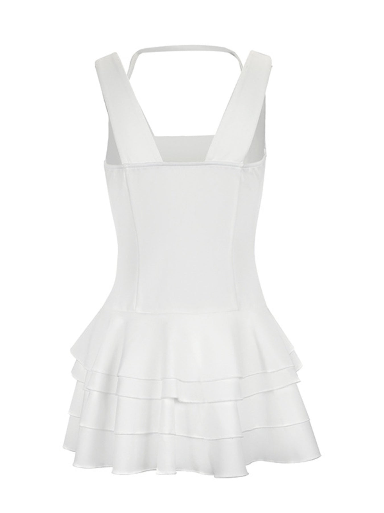 White dress with ruffled layers on a white background