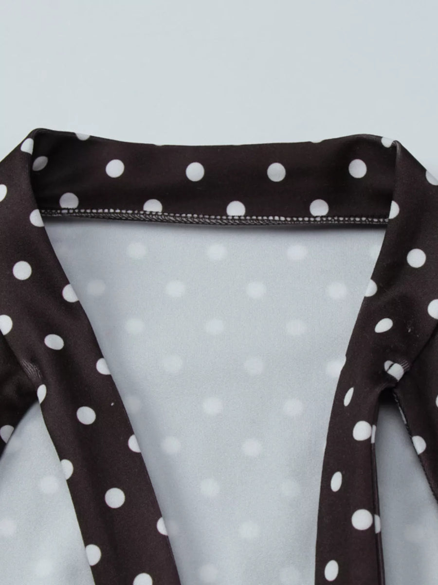 Brown polka dot fabric with a white background