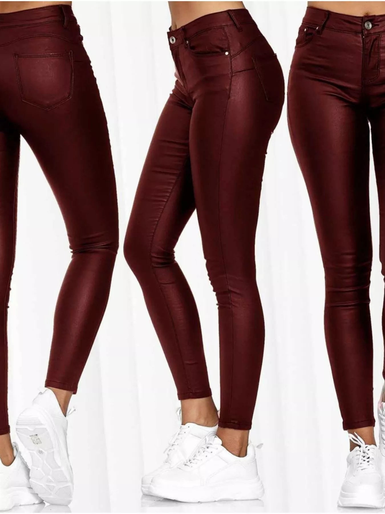 Maroon leather pants worn by a person on a white background