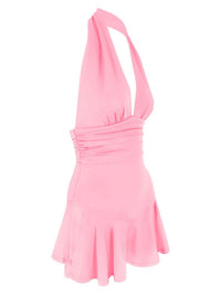 Pink halter neck dress on a white background