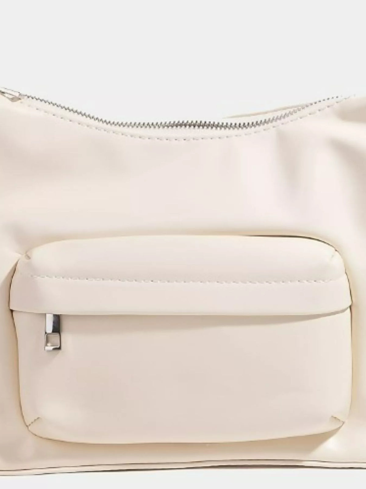 Close-up of a beige handbag with a zipper and pocket on a white background