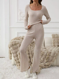 Woman wearing a beige ribbed knit outfit in a cozy room.