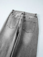 Gray jeans on a white background