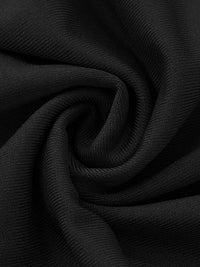 Close-up of black fabric with a textured pattern