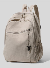 Beige backpack with a brand logo on a light gray background