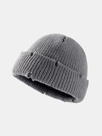 Gray knit beanie on a white background