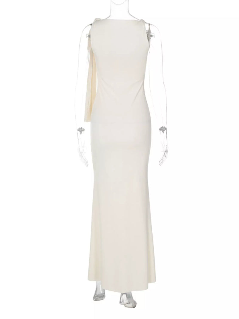 White evening gown on a mannequin against a white background