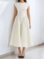 White dress worn by a person on a white background