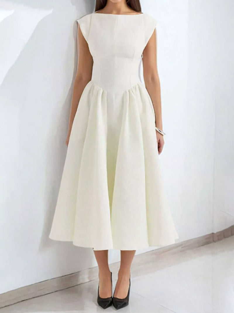 White dress worn by a person on a white background