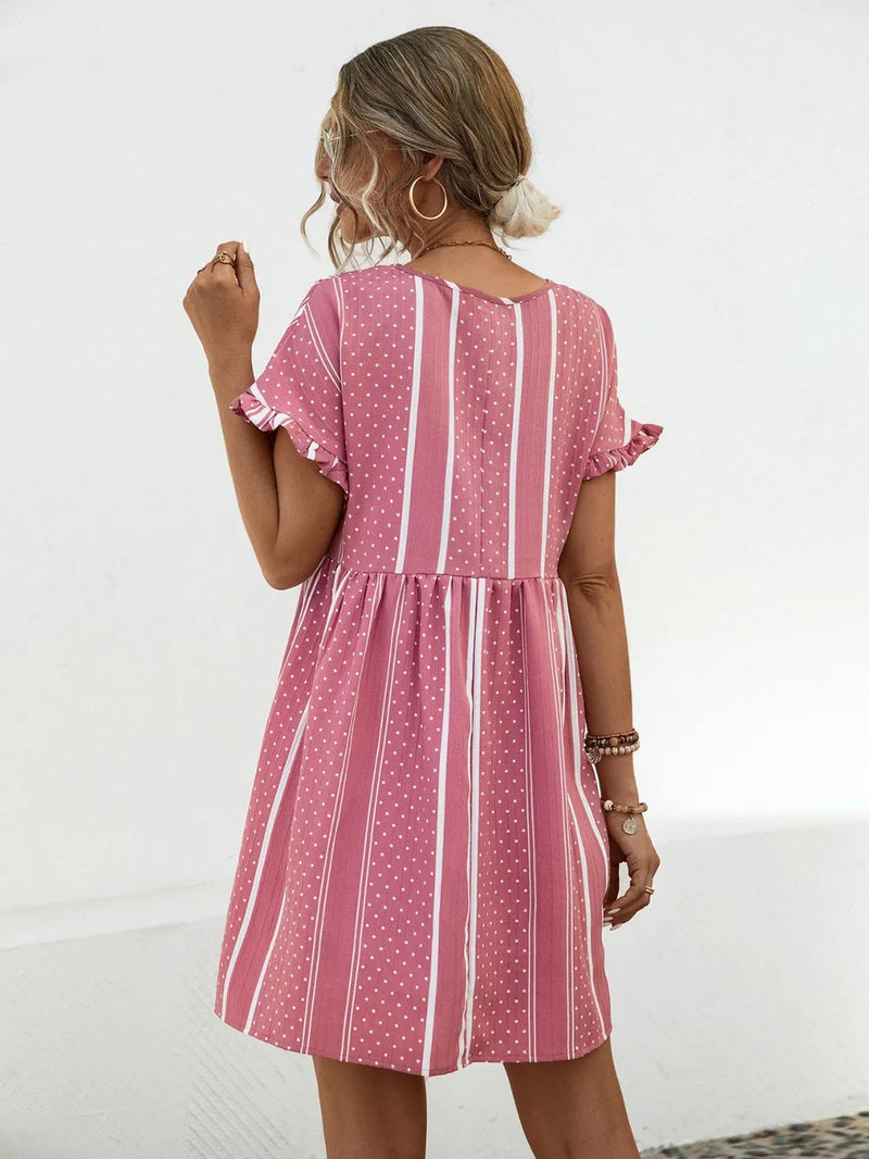 Woman showing the back of Striped Polka Dot Frill Short Sleeve Mini Dress 