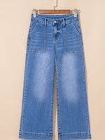 Blue jeans on a beige background