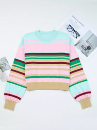 Colorful striped sweater on a white background