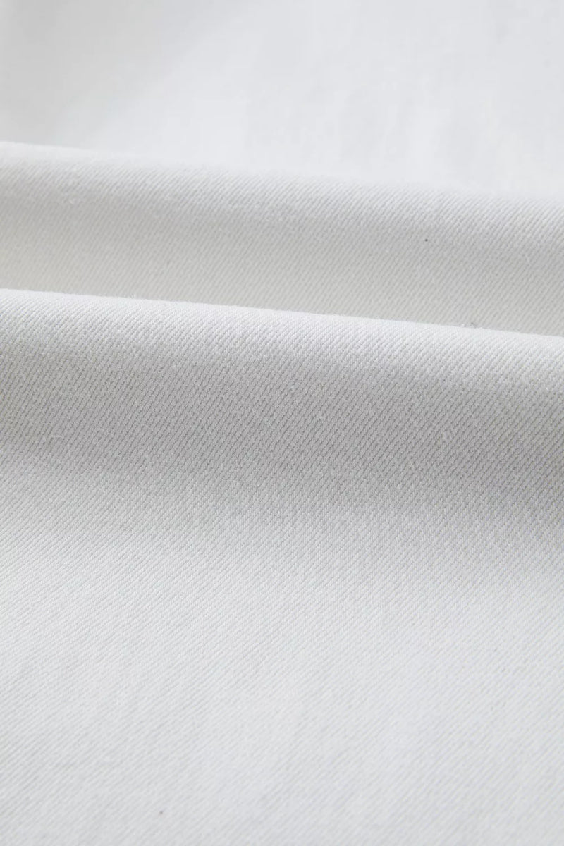 Close-up of white fabric with a subtle texture