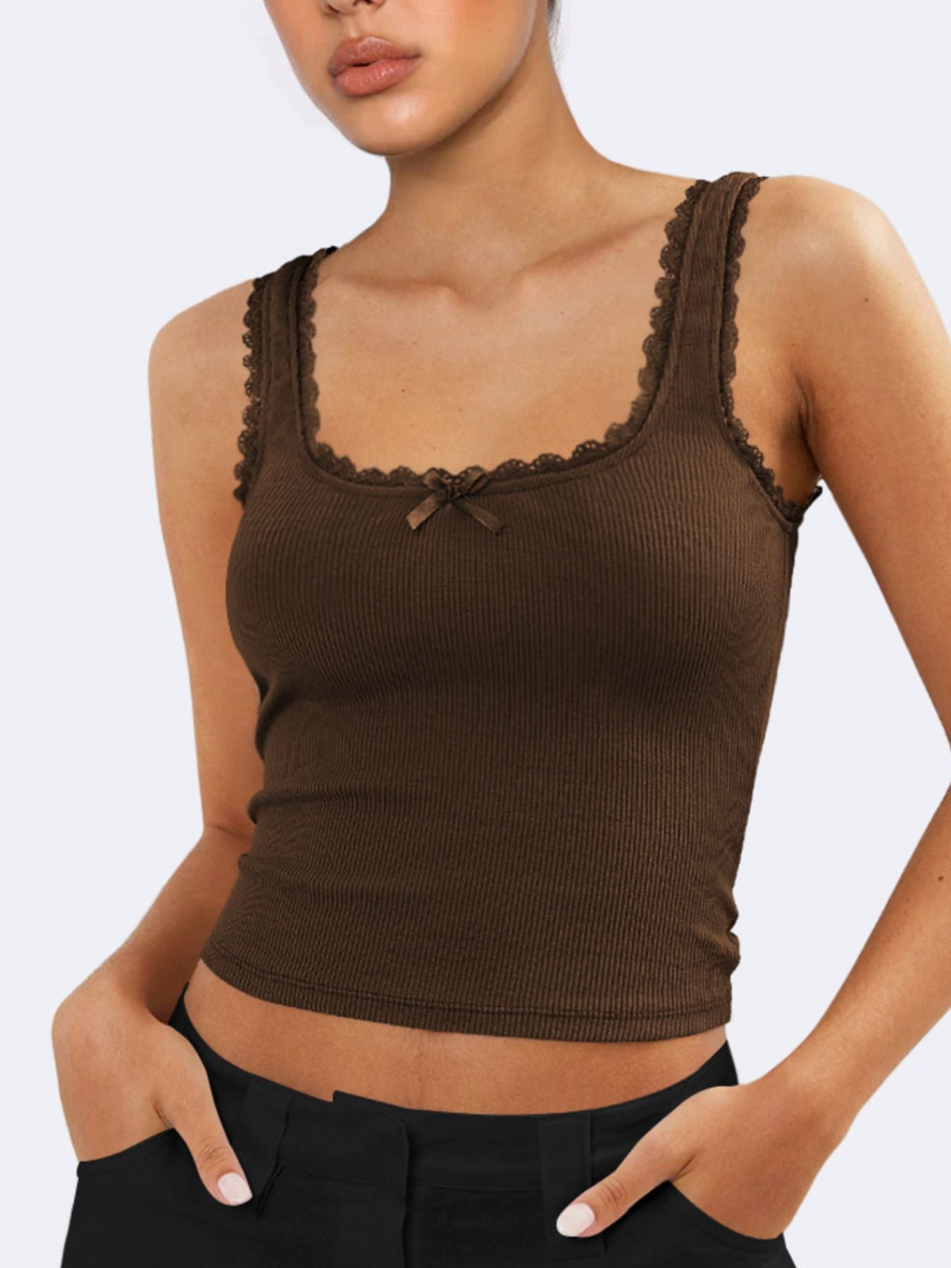 Brown ribbed tank top with lace trim worn by a model on a white background
