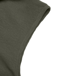Close-up of a green fabric corner on a white background