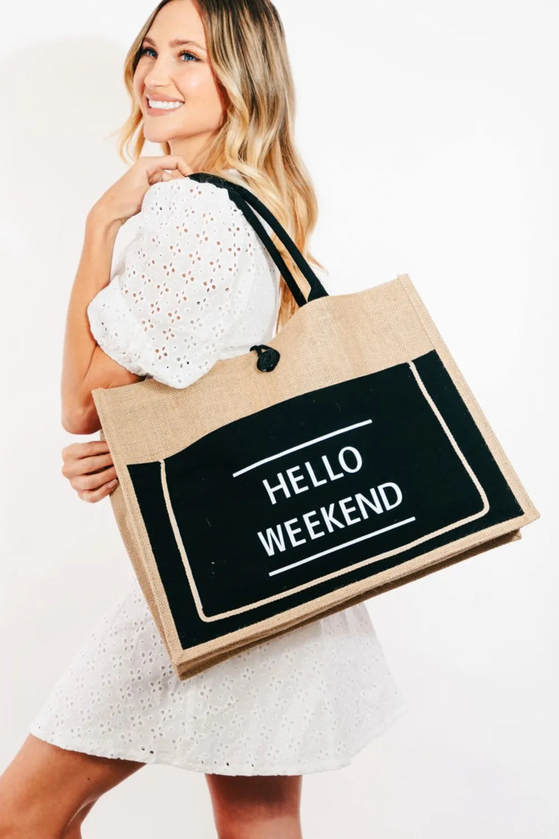 Woman holding a tote bag with 'Hello Weekend' text against a white background