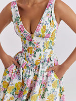 Woman wearing a floral dress with a white background