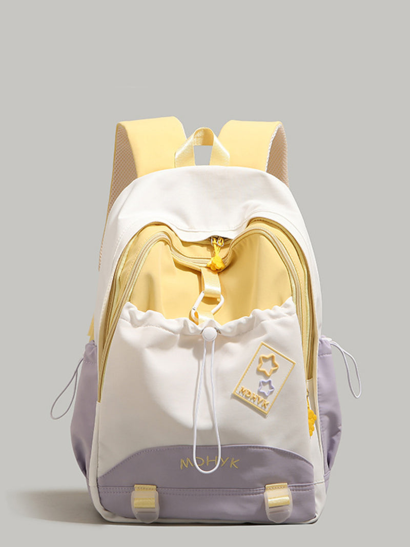 Backpack with gold accents and a visible brand logo on a gray background