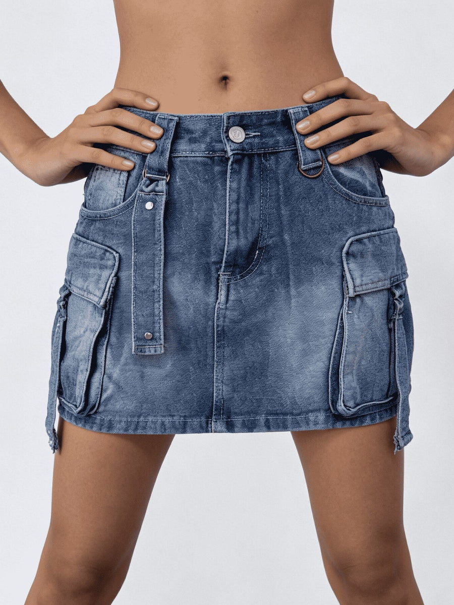 Blue denim skirt worn by a person on a white background