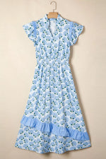 Blue floral dress on a beige background