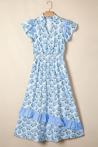 Blue floral dress on a beige background