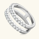 Silver ring with embedded diamonds on a white background