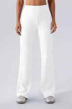 White wide-leg pants worn by a person on a plain background
