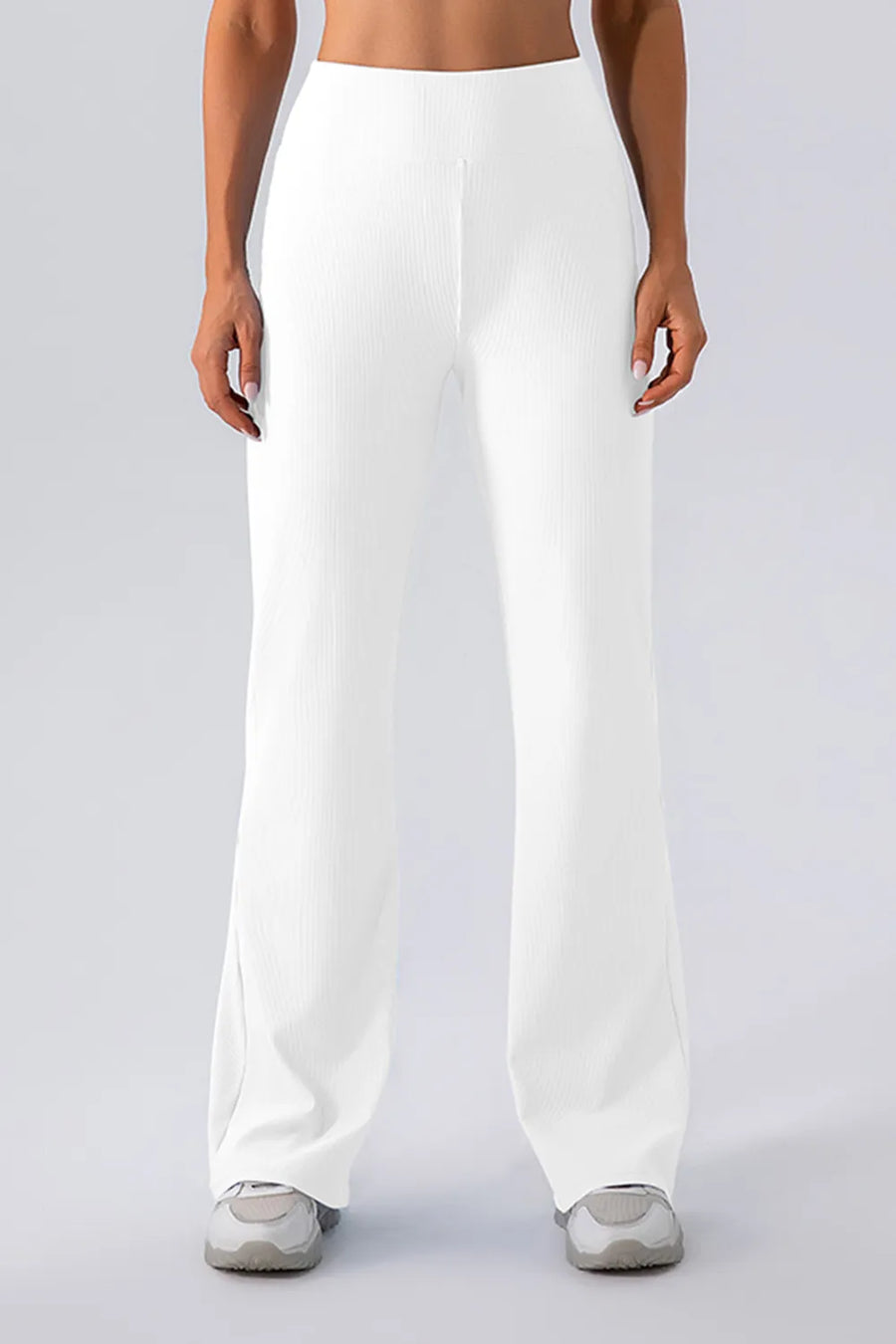 White wide-leg pants worn by a person on a plain background