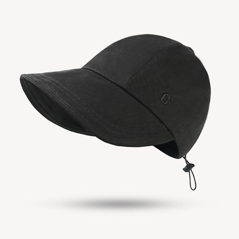 Black cap with a chin strap on a white background