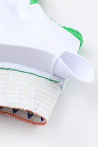 Close-up of a white glove with green and red accents on a white background
