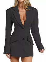 Black blazer dress worn by a model on a white background