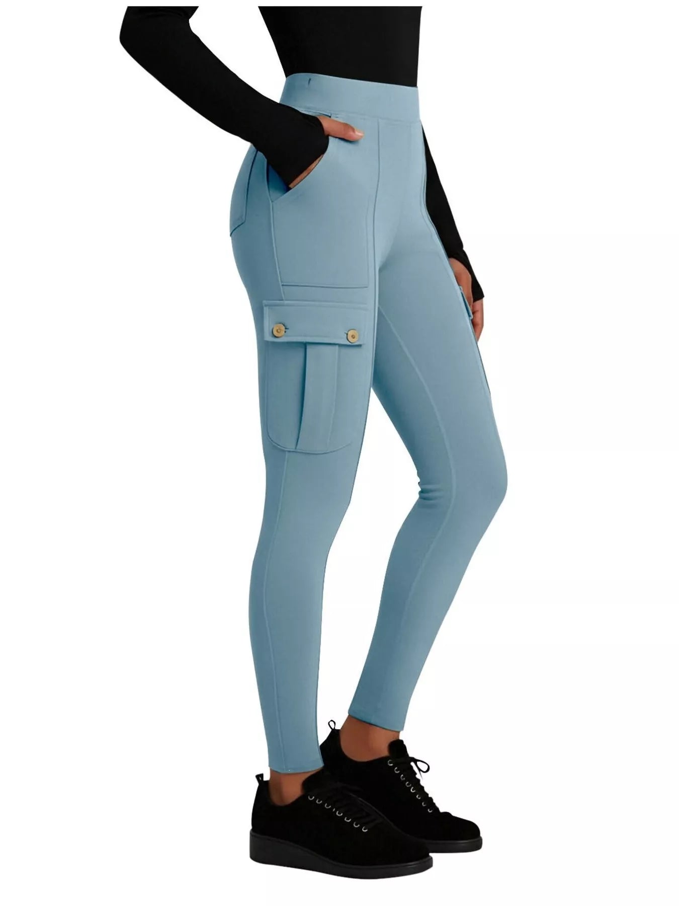 Light blue leggings with pockets worn by a person on a white background