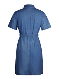 Blue denim dress on a white background