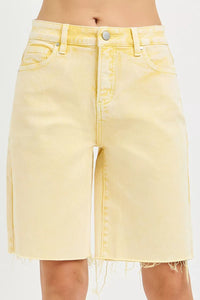 Yellow denim skirt on a white background