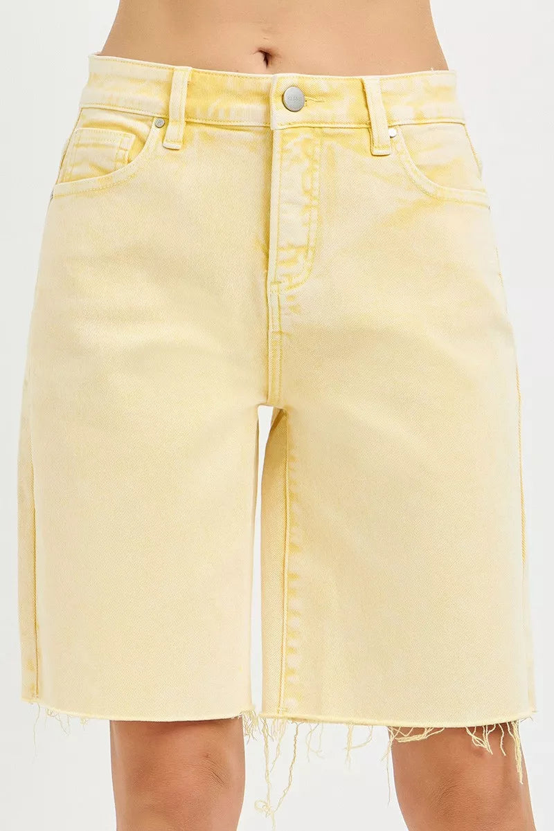 Yellow denim skirt on a white background