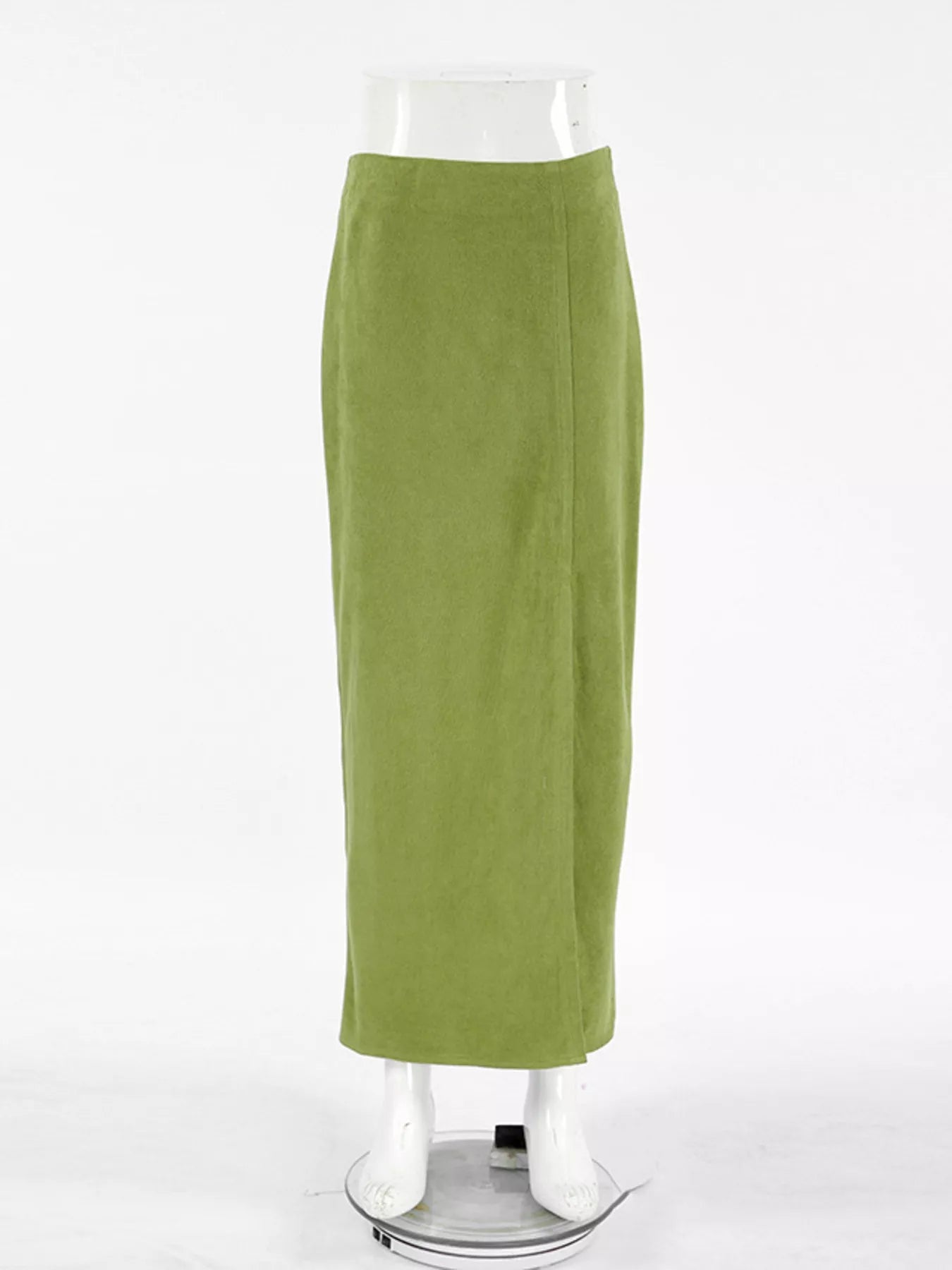 Green skirt on a mannequin against a white background