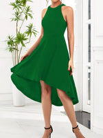 Green dress worn by a person in a bright indoor setting