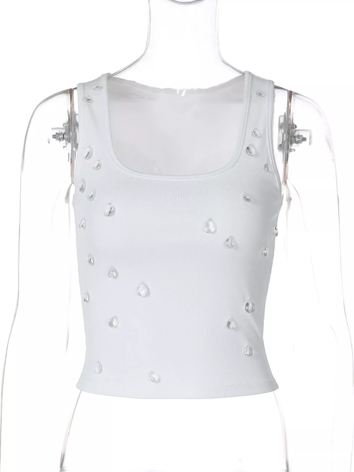 White tank top with pearl embellishments on a mannequin against a white background