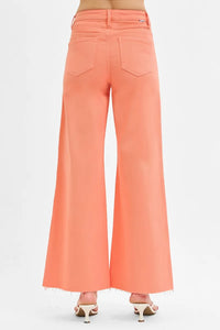 Coral wide-leg pants on a white background