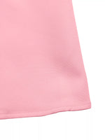 Close-up of a pink fabric corner on a white background