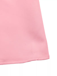 Close-up of a pink fabric corner on a white background