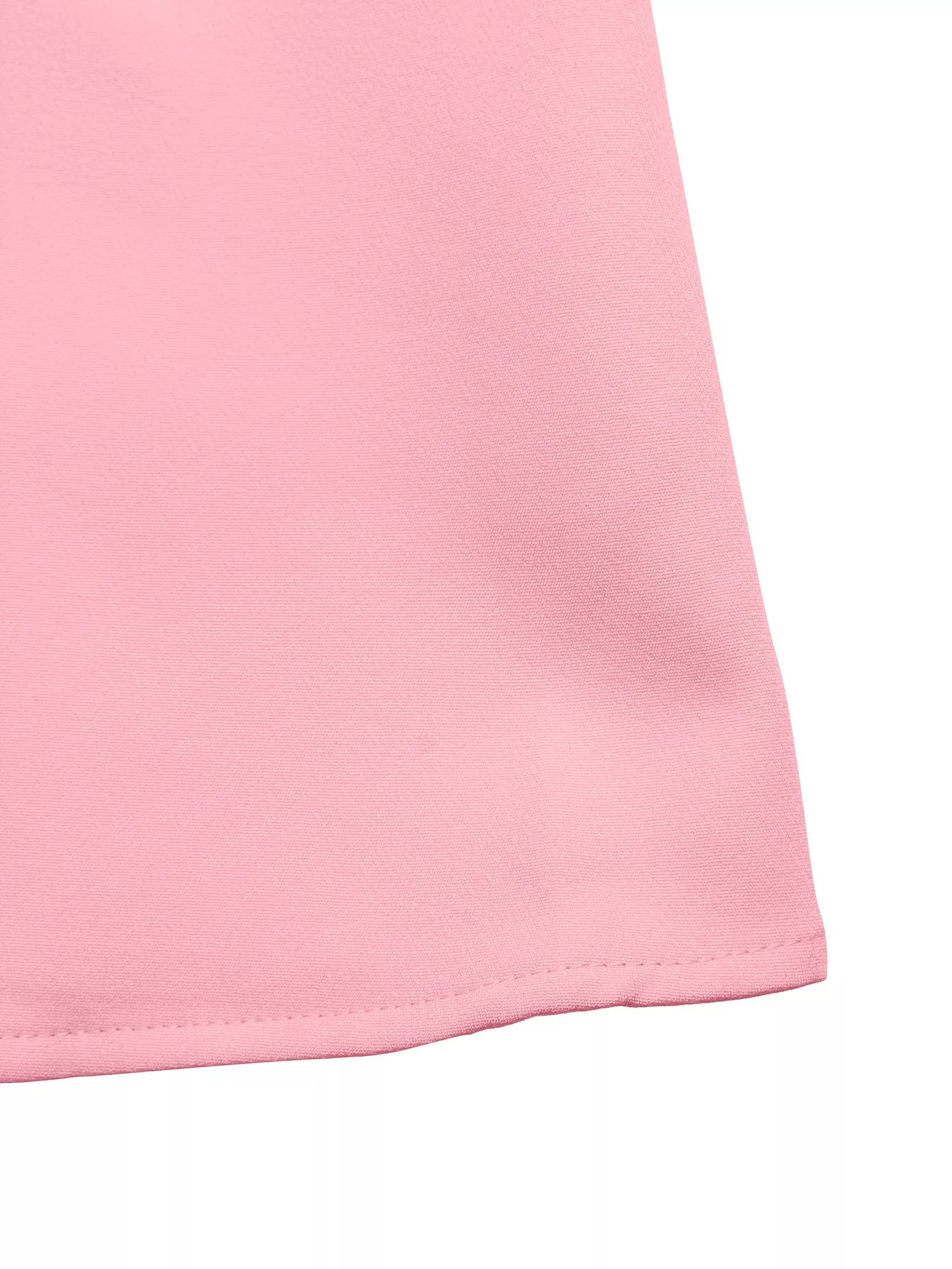 Close-up of a pink fabric corner on a white background