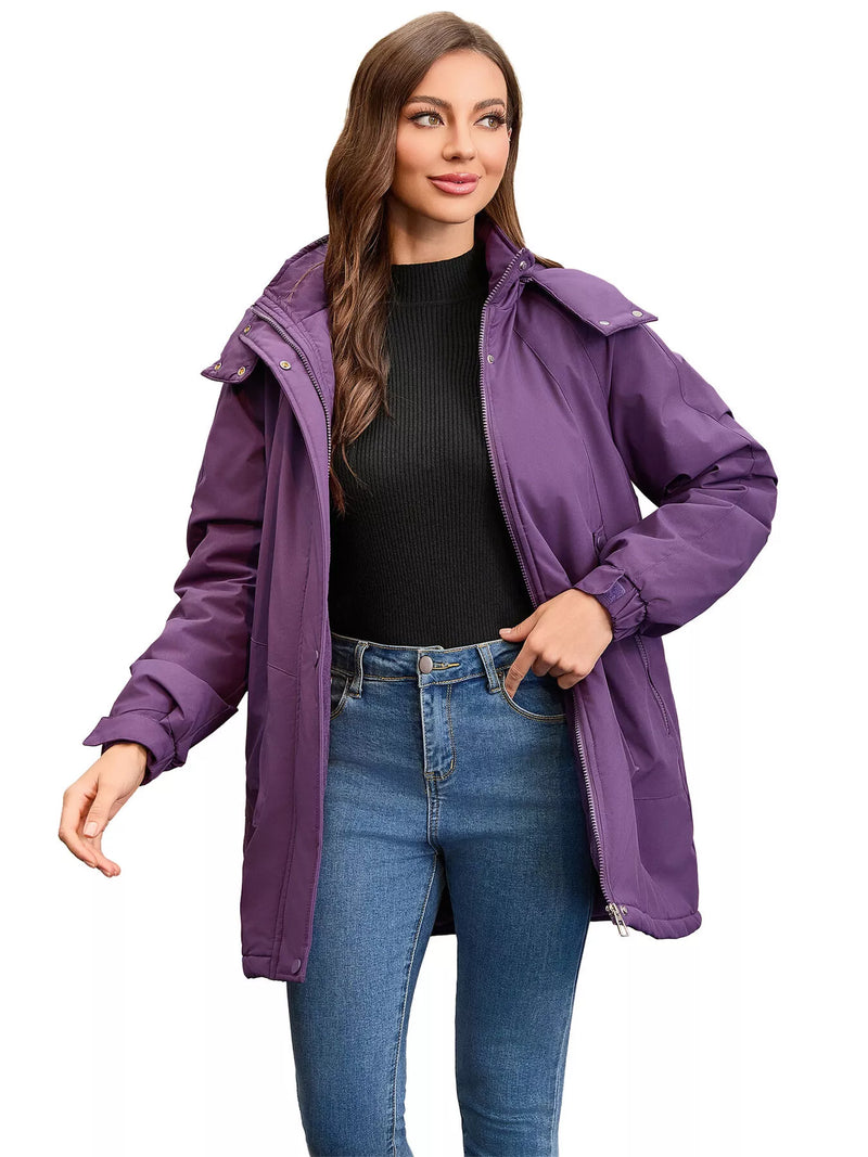Woman wearing a purple jacket on a white background