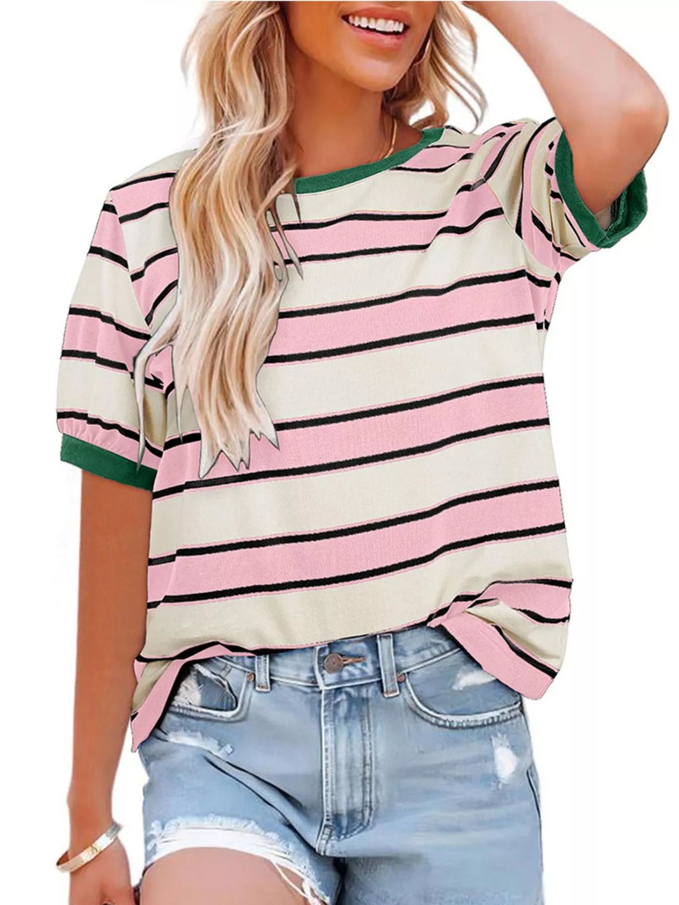 Woman wearing a striped shirt with pink, white, and green colors.