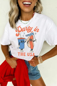 Person wearing a white t-shirt with 'Party in the USA' graphic design.