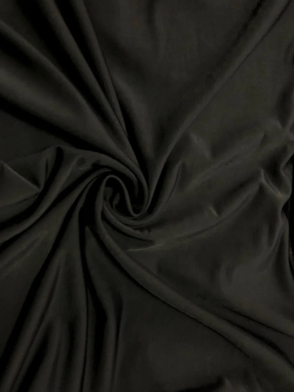 Close-up of dark fabric with folds