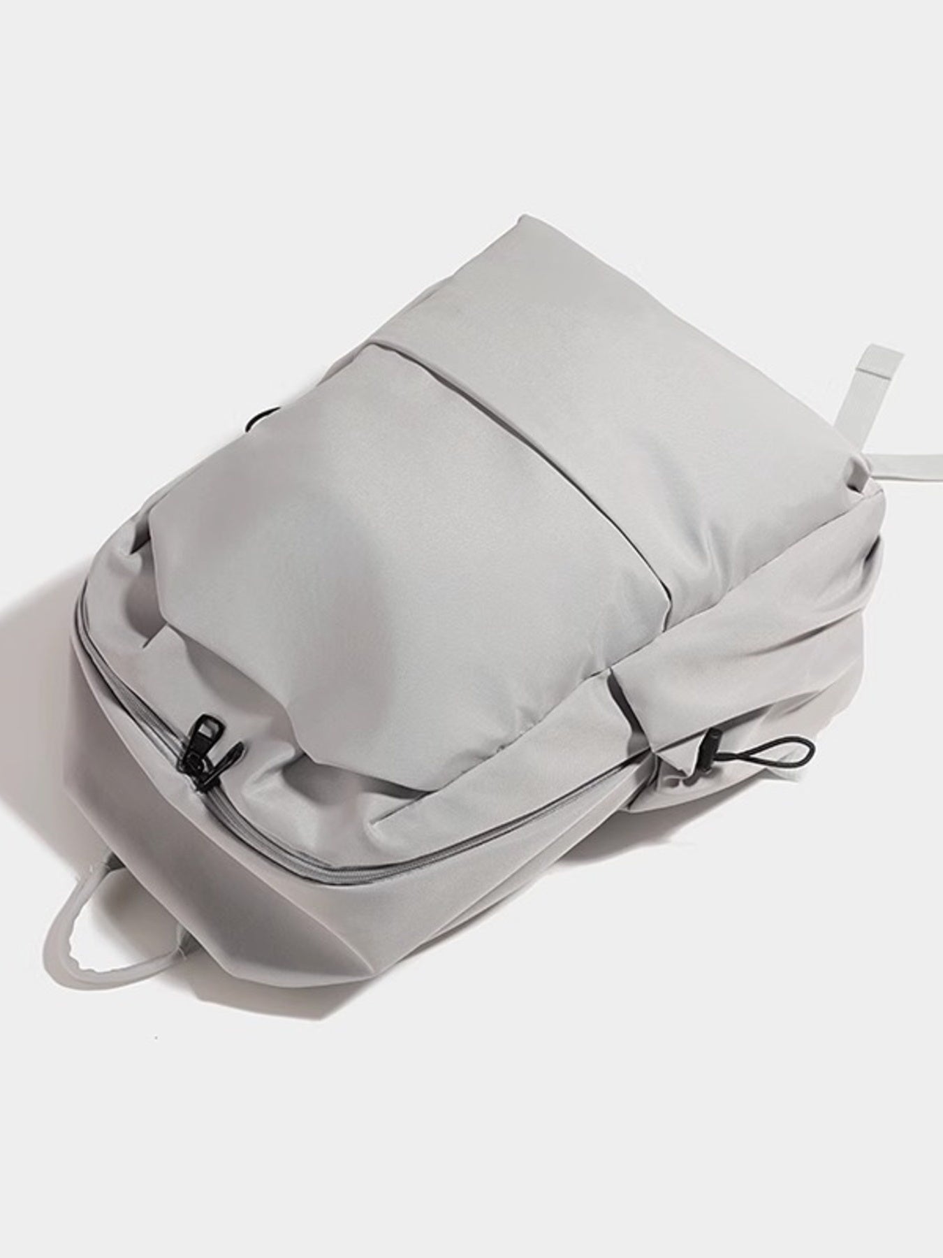 Gray backpack on a white background