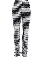 Black and white textured striped knit pants with cuffed ankles, shown on a plain white background.